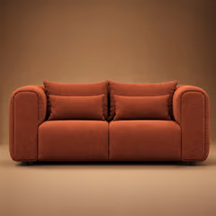 The terracotta Luma sofa on a warm studio backdrop